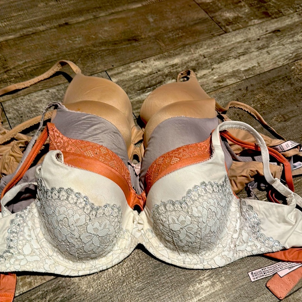 The white one is a 32DD. The others are 32D